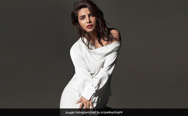 Priyanka Chopra In All-White Proves That A Red Lip Is The Only Accessory You Need