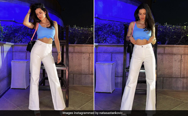 Natasa Stankovic Is Picture Perfect In A Bright Crop Top And Flared White Jeans