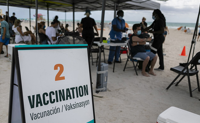 'Vaccine Tourists' Fly For Injections On US Beach