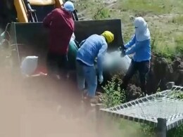 Excavator Used By Family To Carry, Dump UP Covid Vicitm's Body In Grave Excavator Used By Family To Carry, Dump UP Covid Vicitm's Body In Grave