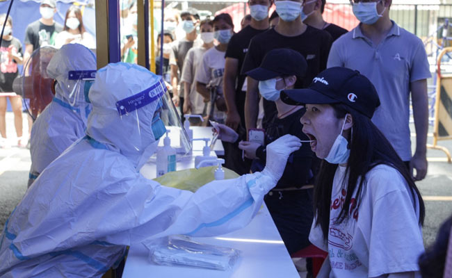 China's Wuhan To Test 'All Residents' As Covid Returns