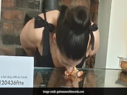 Watch: UK Woman Breaks Records For Fastest Time To Eat Hot Dog With No Hands Watch: UK Woman Breaks Records For Fastest Time To Eat Hot Dog With No Hands