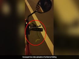 Unwanted Hitchhiker: Biker Screams After Noticing Snake Entangled In Motorbike Handle Unwanted Hitchhiker: Biker Screams After Noticing Snake Entangled In Motorbike Handle