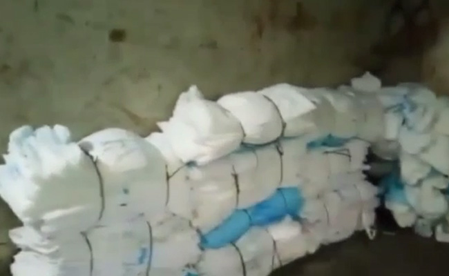 Video Shows Madhya Pradesh Plant Washing Used Covid Safety Kits For "Resale"