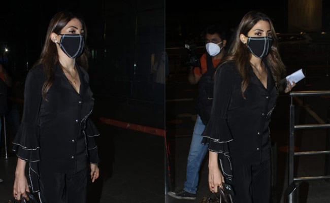 Nikki Tamboli's Rs 1.5 Lakh Louis Vuitton Handbag Adds Colour To Her All-Black Airport Outfit