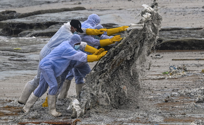 Burning Ship Covers Sri Lankan Beach With Tonnes Of Plastic