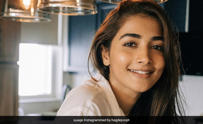 Pooja Hedge Redefines Breezy Summer Style In A White Lace Shirt