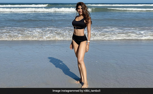 We Can't Get Enough Of Nikki Tamboli Sunkissed In A Black Bikini