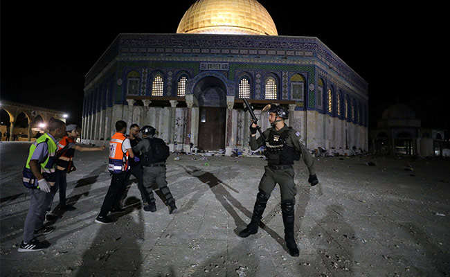 Scores Injured As Israeli Police, Palestinians Clash At Jerusalem's Al-Aqsa