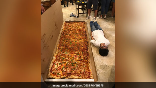The Picture Of 'Biggest Pizza' Elicits Hilarious Responses On Reddit