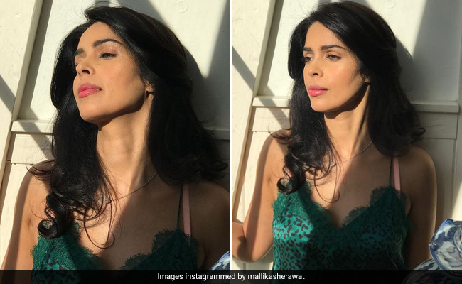 Mallika Sherawat Is A Stunning Summer Girl In Pink Lipstick And Soft Curly Locks