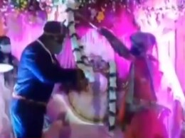 Watch: Bride, Groom's Social Distancing Twist To Wedding In Covid Times Watch: Bride, Groom's Social Distancing Twist To Wedding In Covid Times