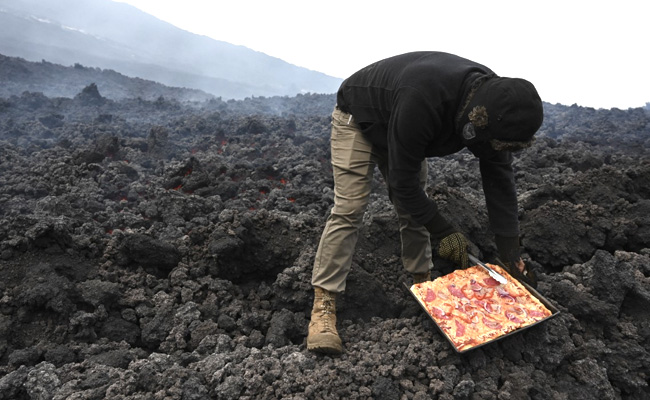 Man Cooks Pizza On Smouldering Volcano