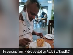 Man Tries To Slice Through Table Napkin Mistaking It For A Dessert, Hilarious Video Goes Viral Man Tries To Slice Through Table Napkin Mistaking It For A Dessert, Hilarious Video Goes Viral