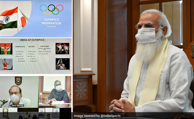 PM Stresses On Vaccination For All Travelling To Tokyo At Olympics Review Meet
