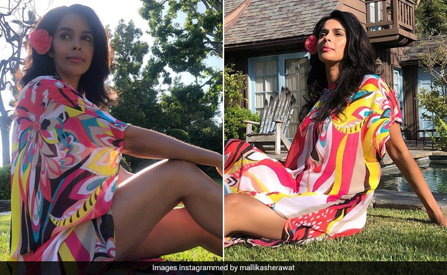 Mallika Sherawat Makes Sunny Days Brighter With Her Pretty Floral Printed Kaftan