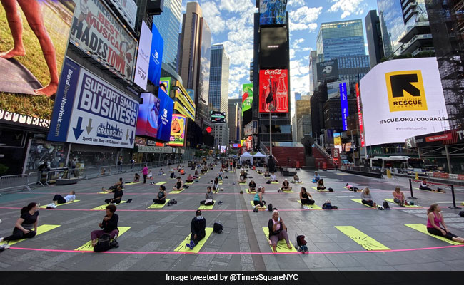 Over 3,000 People Perform Yoga At Iconic Times Square