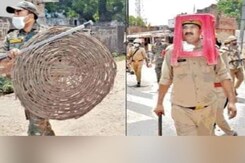 UP Cop Uses Plastic Stool As Riot Gear, Bosses Demand Explanation UP Cop Uses Plastic Stool As Riot Gear, Bosses Demand Explanation