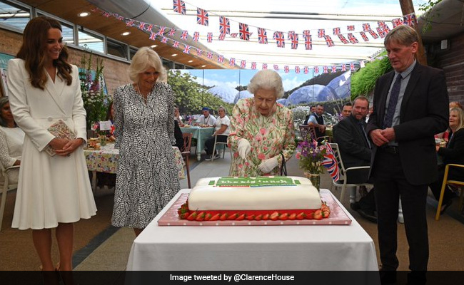 Video: Queen Elizabeth Cuts Cake With Ceremonial Sword On Sidelines Of G7
