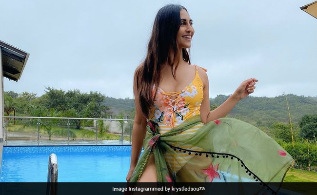 Krystle D'Souza Is Making The Most Of Summer Days In A Sunny Yellow Printed Swimsuit