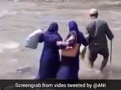 Watch: J&K Health Workers Cross River To Take Vaccine To Remote Area