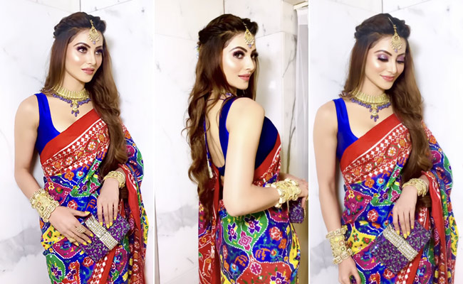 Only Urvashi Rautela Can Add Her Touch Of Glam To A Vibrant Patola Saree
