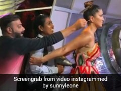 सनी लियोन शॉट के लिए हो रही थीं तैयार, तभी इस शख्स ने उनके कान में कर दी गुदगुदी...देखें Video