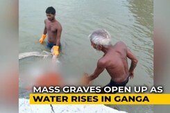 In UP's Prayagraj, Mass Graves Open Up As Water Rises In Ganga In UP's Prayagraj, Mass Graves Open Up As Water Rises In Ganga