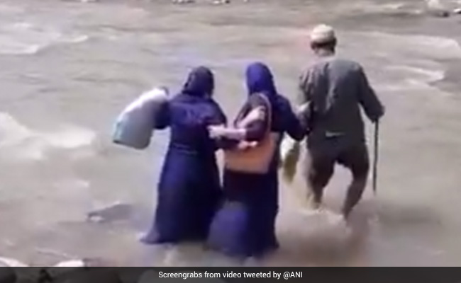 Watch: J&K Health Workers Cross River To Take Vaccine To Remote Area