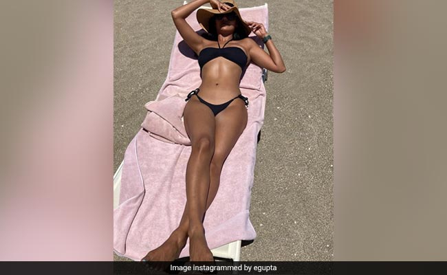 Esha Guupta Soaking Up Some Sun In A Black Bikini Is Where We Are Mentally Today