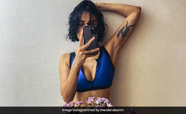 Mandana Karimi’s Chic Bikini Is A Greater Distraction Than The Prettiest Flowers Too