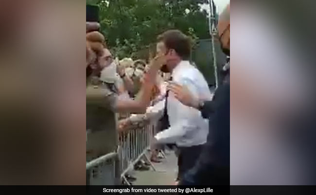 On Camera, France's Macron Slapped By Man He Tried To Shake Hands With