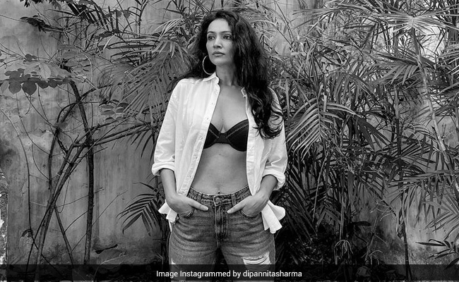Dipannita Sharma Keeps It "Au Naturel" In A Shirt And Distressed Jeans Paired With A Bra