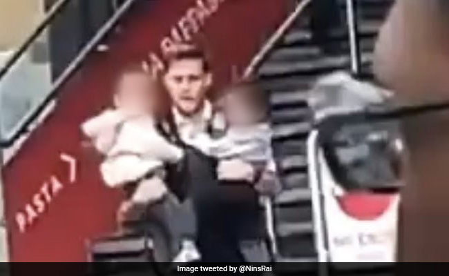 Watch: Hero Cop Rescues Two Children From Burning Station