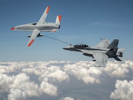 US Navy Uses Drone To Refuel Plane During Flight US Navy Uses Drone To Refuel Plane During Flight