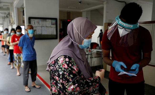Covid Vaccination Mandatory In Singapore From February 2022