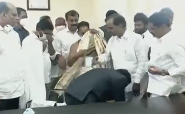 Citing Father's Day, Telangana Collector Touches Chief Minister's Feet