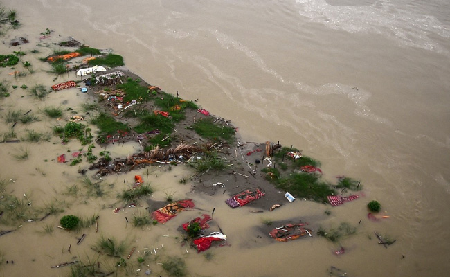Rain Reveals Floating Corpses In Ganga, Dislodges Bodies Buried In Banks