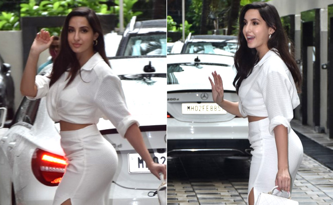 Trust Nora Fatehi To Add Glam To All Her White Outfits With Her Rs 5.5 Lakh Chanel Handbag