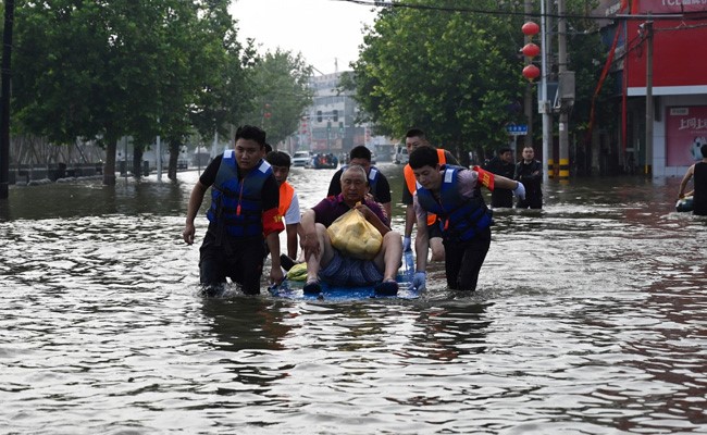 Death Count In Central China Floods Rises To 302, 50 Missing