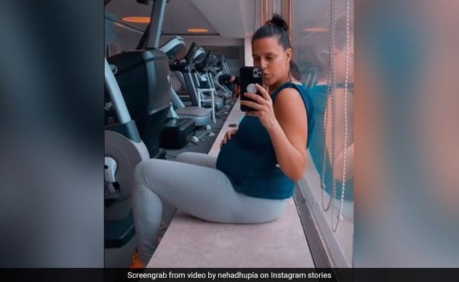 Can You Spot The "Baby Daddy" In Neha Dhupia's Gym Post?