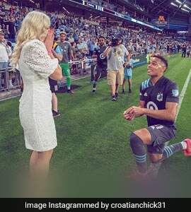 Watch: American Football Player Proposes To Girlfriend On Pitch