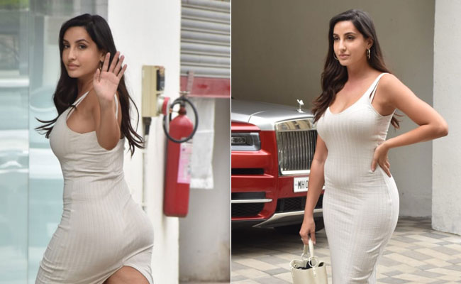 Nora Fatehi's Bodycon Dresses Are A Hit When Her Rs 3.2 Lakh Handbag Adds Pizzazz To The Look