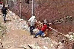Caught On Camera: Man Slapped, Knocked Out In Haryana Colony Being Razed Caught On Camera: Man Slapped, Knocked Out In Haryana Colony Being Razed