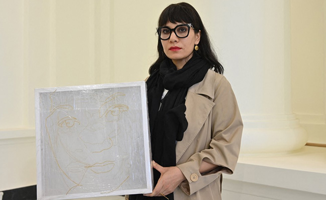 "Will I Be Alive?": Afghan Woman Photographer Under Threat