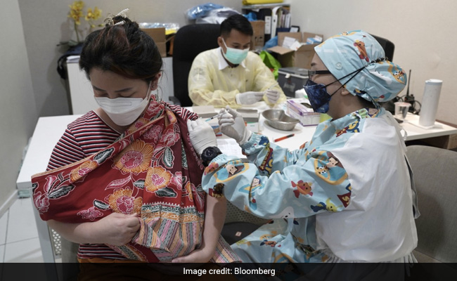 WHO's Chief Scientist Warns The Pandemic Isn't Slowing Down