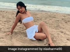 Nia Sharma Video: निया शर्मा समंदर किनारे रेत से यूं खेलती आईं नजर, वायरल हुआ एक्ट्रेस का Video