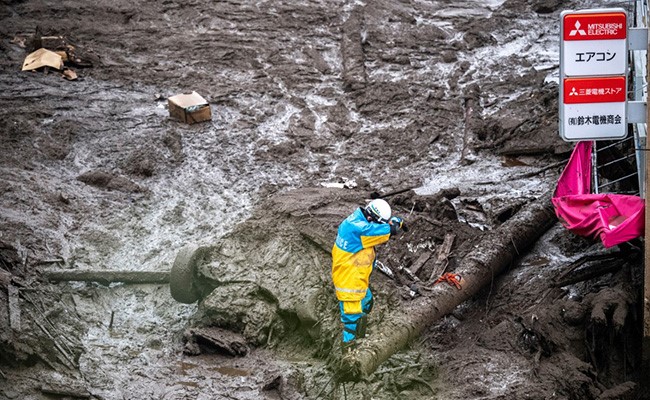 Rescuers Search For Survivors In Landslide-Hit Japan Town