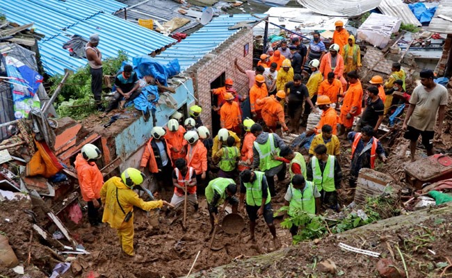 In Pics: Heavy Rains Cause Waterlogging In Mumbai, Train Services Hit