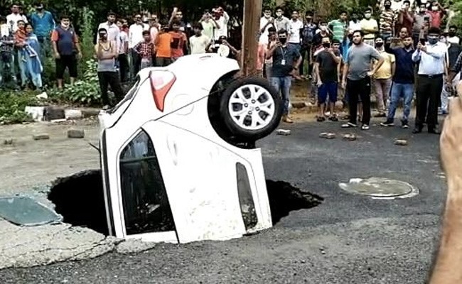 Video: Delhi Cop's Car Falls Into Sinkhole While Being Driven After Rain